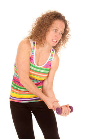 A woman working out with a little weights.の写真素材