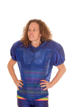 A woman in her football pads standing.の写真素材