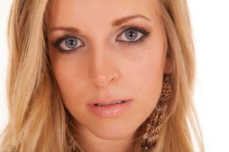 a close up of a woman's face with her lips parted.の写真素材