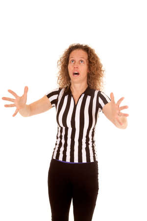 A woman referee not sure what to call the call.の写真素材