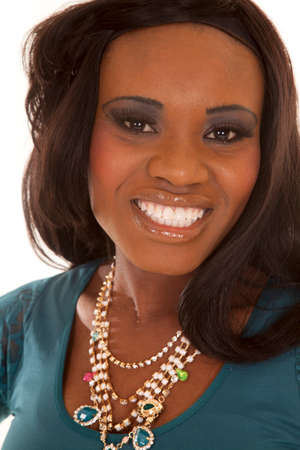A close up of a woman's face with a smile.の写真素材
