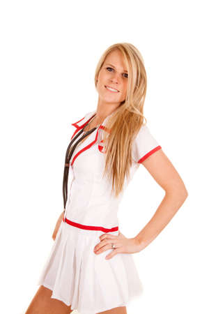 A woman in her nurse outfit, wearing her stethoscope around her neck.の写真素材