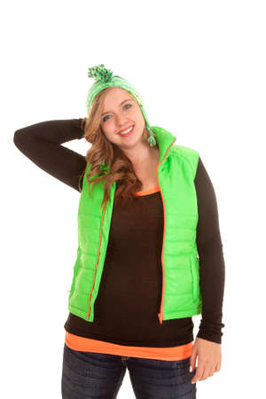 a woman in her winter clothes wearing a winter hat and vest.の写真素材