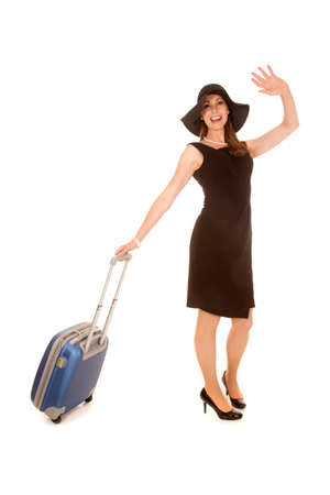 a woman getting ready to leave on a trip.の写真素材