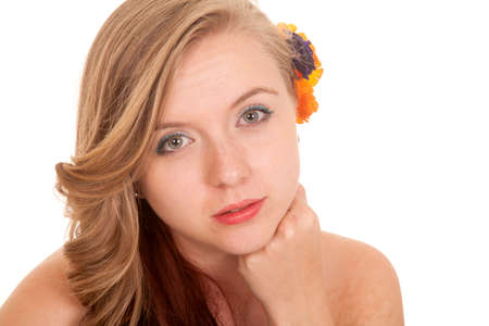 A woman with a serious expression on her face.の写真素材