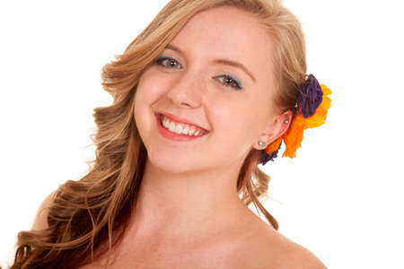 a woman with a smile on her face close up.の写真素材