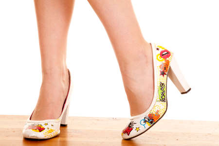 A woman standing in her fun shoes.の写真素材