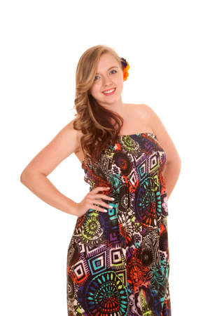 a woman in her colorful dress with a happy expression on her faceの写真素材