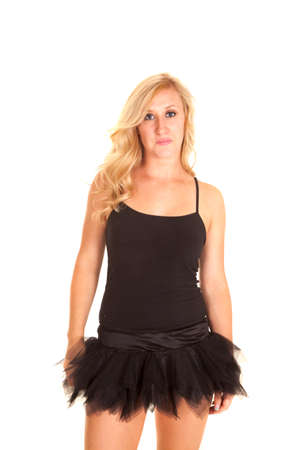 a woman in a black tutu with a serious expression.の写真素材