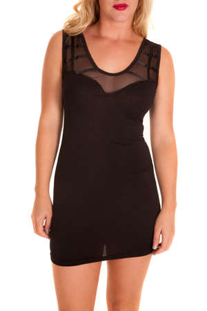A woman in her fitted black dress with a sheer topの写真素材