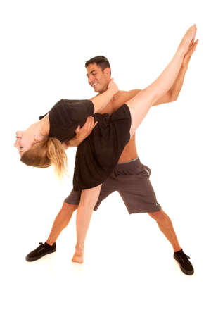 a man and woman showing off their dance moves.の写真素材