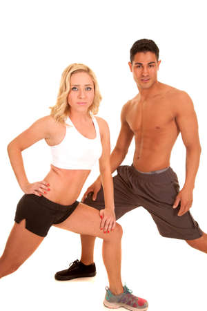 A man and woman working out together being physically fit.の写真素材