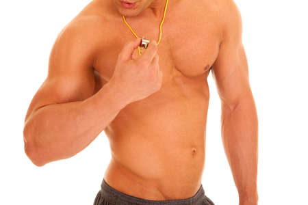 A man getting ready to blow on his whistle.の写真素材