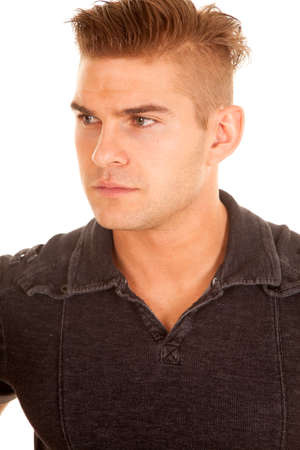 a close up of a man in his gray top looking to the side.の写真素材