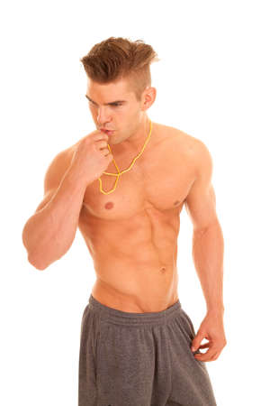 A man getting ready to blow on his whistleの写真素材