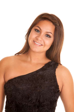 A woman  with a smile in her black top with flowers.の写真素材