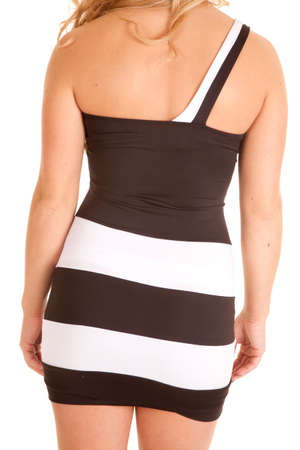 A woman in her short black and white dress.の写真素材