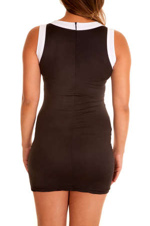 A woman in her black and white fitted dress, back view.の写真素材