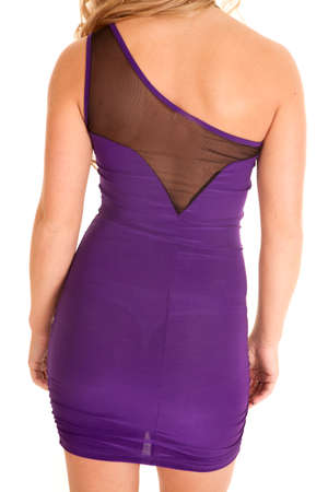 A woman showing off the back of her purple dress.の写真素材