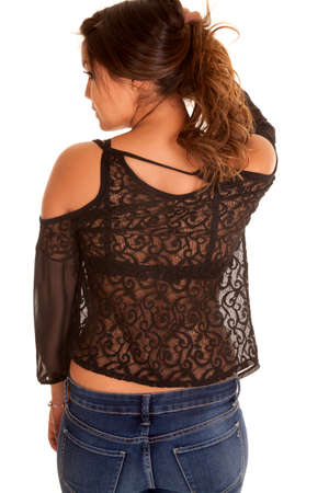 A woman's back in a black lace top.の写真素材