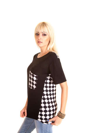 A woman in a top with a checker board design on it.の写真素材