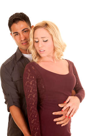 A man and woman close together, with their hands on each other.の写真素材