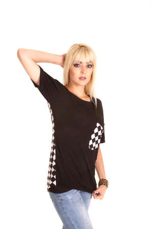 A woman in her black shirt with a black and white checker print.の写真素材