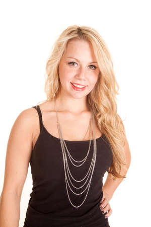 A woman in her black tank and a siver necklace.の写真素材