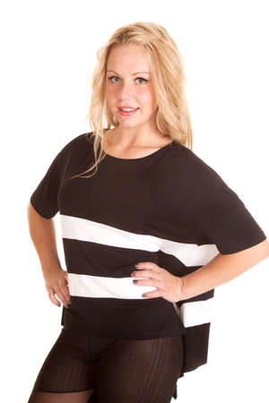 a woman in her leggings and black sweater.の写真素材