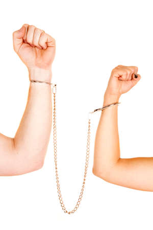 A man and woman with their arms locked up together.の写真素材