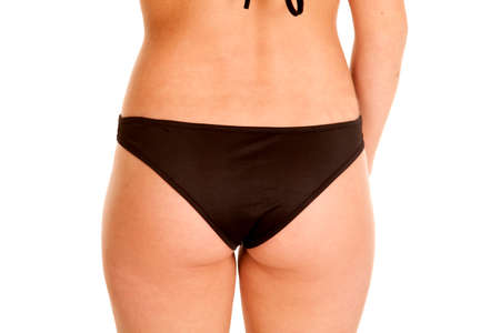 A woman's back in her bikini bottom.の写真素材
