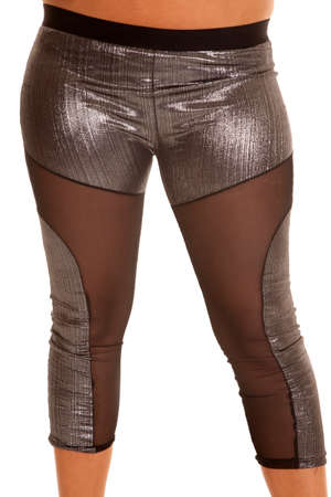 A woman with the front view of her leggings with sheer legs.の写真素材