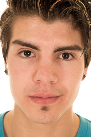 A man looking close up with a serious expression.の写真素材