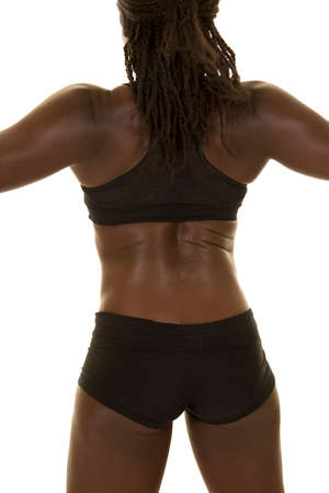 An African American woman in her fitness clothes, with her back showing.の写真素材