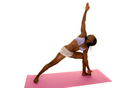 An African American woman stretching out her body.の写真素材