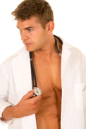 A Doctor with a stethoscope looking to the side.の写真素材
