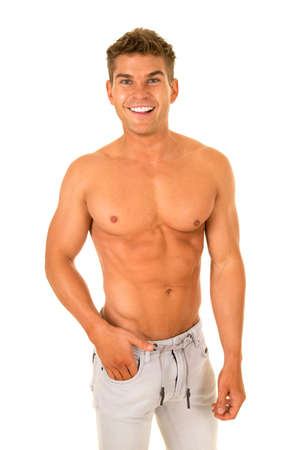 a man without his shirt showing off his muscular torso.の写真素材