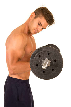 a man working out with weights flexing his arms.の写真素材