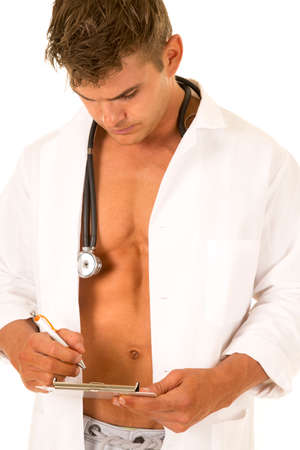 A Doctor looking down at his clipboard.の写真素材