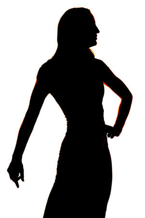 a silhouette of a woman in her dress with a white background.の写真素材
