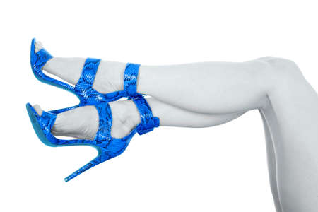 A woman's legs with her blue heels.の写真素材