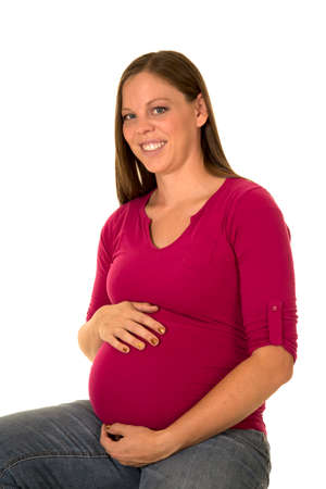 A pregnant woman with a smile.の写真素材