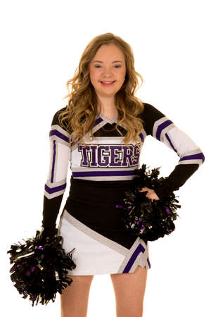 A cheerleader with down syndrome smiling at the camera.の写真素材