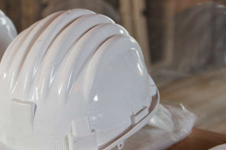 White safety helmet for protection on a construction workplace