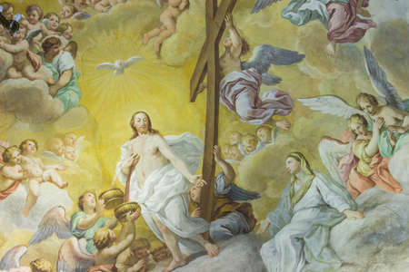 A colorful Italian Renaissance fresco on the arched ceiling of an ancient church.のeditorial素材