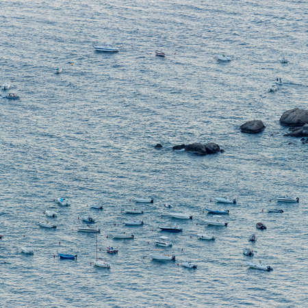 Taormina - Italy: Boats anchored off the coast of Sicilyの写真素材