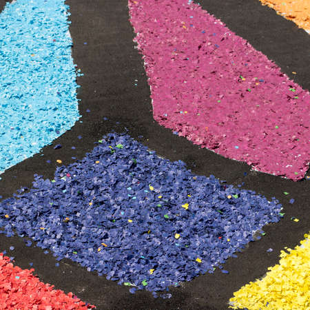 The colored confetti on the ground, useful for backgroundの写真素材