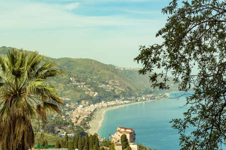 View of the beautiful Sicilian coast from the enchanting town of Taorminaのeditorial素材
