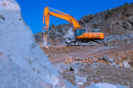 the excavator in a mine in a day's workの写真素材