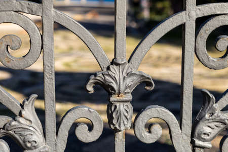 artistic wrought iron in an ancient Sicilian gateの写真素材